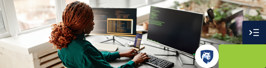 Individual sitting at a desk with multiple monitors displaying code, in a well-lit room with plants. Modern tech workspace